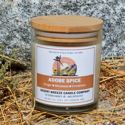 Adobe Spice Candle in a clear Jar against a rock