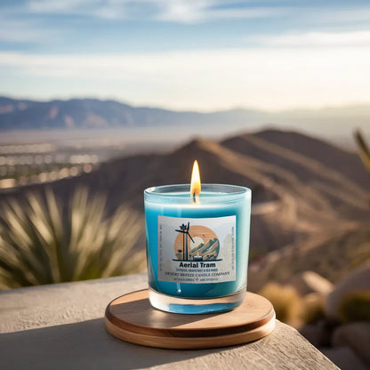 A shy blue candle on the edge of a rocky platform overlooking coachella valley